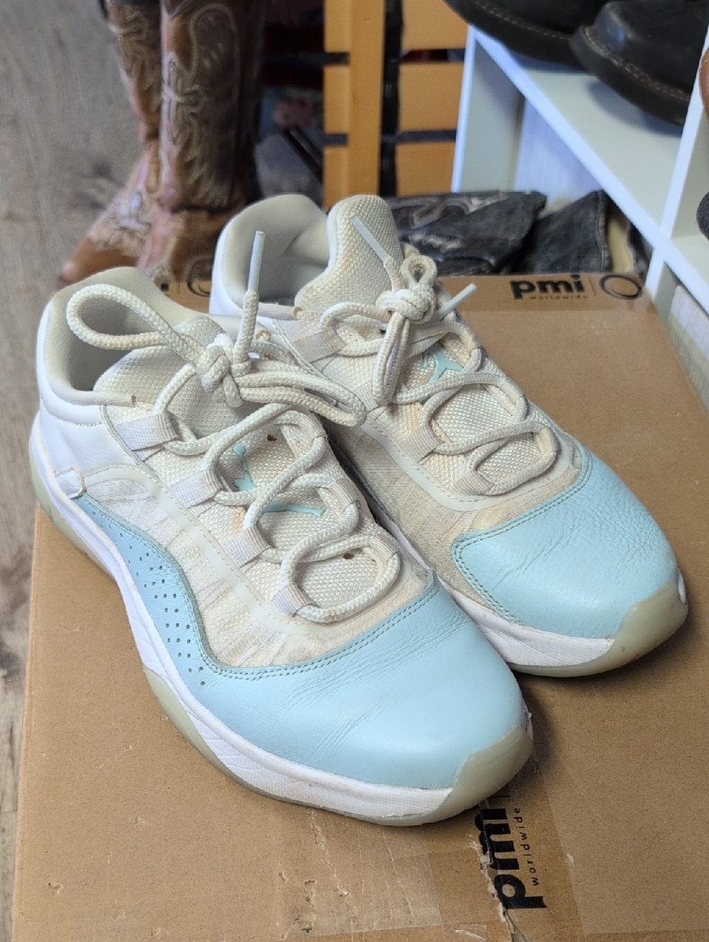 Nike Women's Air Jordan 11 CMFT Low sneakers in the "Igloo" or Glacier Blue
